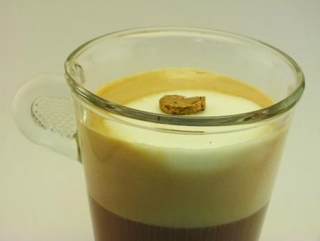Illustration for article titled Gold Aerogel is Light Enough To Float on Cappuccino Foam